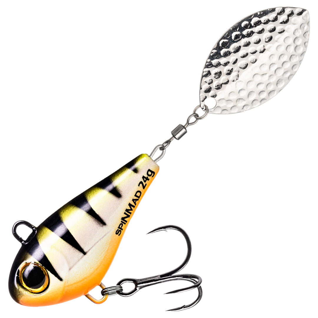 Spinmad Jigmaster Spintail 24g, väri 1501: keltavalkoinen runko, mustat raidat, oranssi vatsa ja hopeinen lippa
